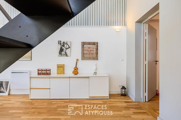 Ancien hangar sublimé en loft d’exception avec jardin intimiste