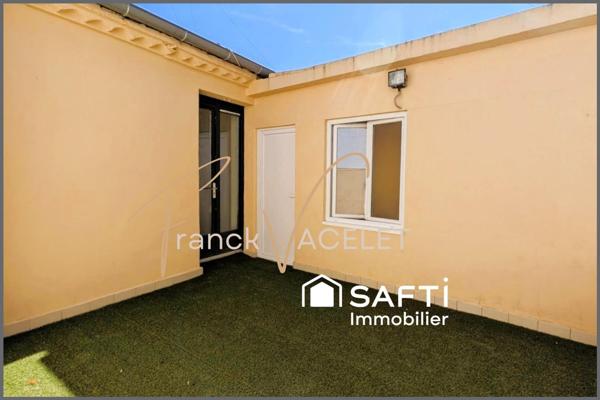 Maison en pierre rénovée avec terrasse au cœur de ville