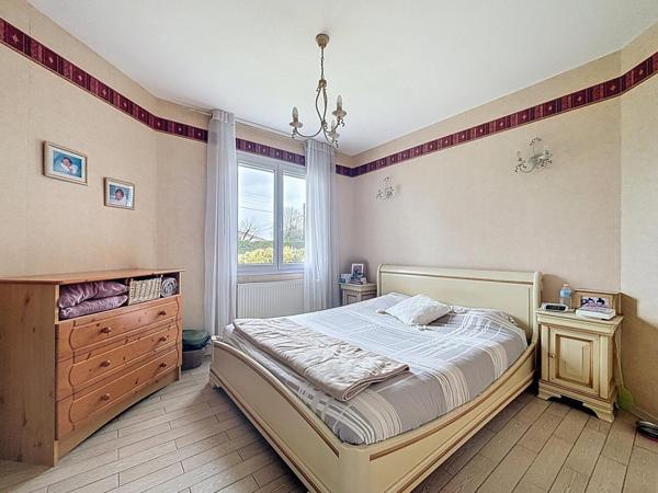 Plain-pied lumineux 136 m² – 4 chambres – Jardin & Garage