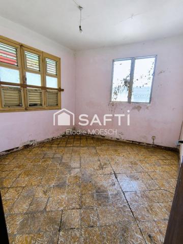 Maison dans le bourg du Saint Esprit