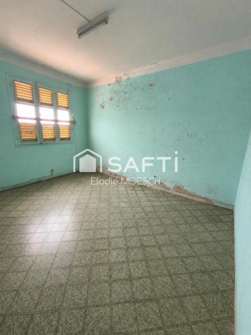Maison dans le bourg du Saint Esprit
