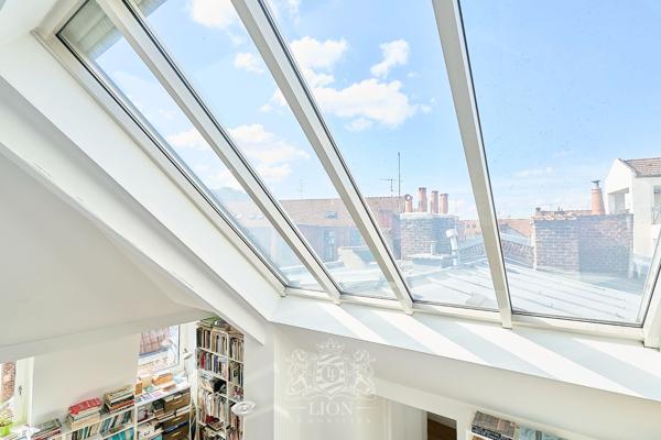 Superbe appartement avec terrasse, parking possible.
