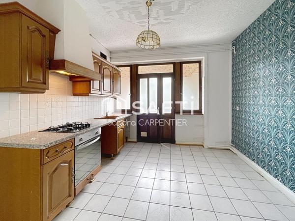 Bel appartement de 61m2 avec une extension possible de 13m² (25m² au sol) et un jardin de 55m²