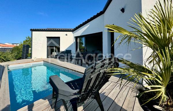 Maison neuve de plain-pied - piscine et vue dégagée