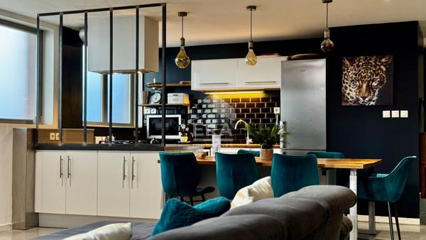 Loft 3 pièces avec parking et terrasse DPE C