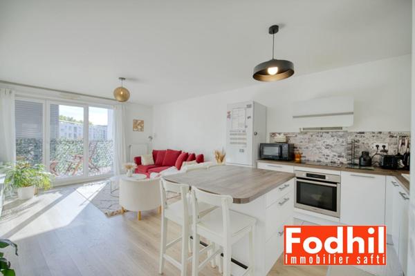 Appartement 4 pièces de 84 m² avec Balcon et un Parking en sous-sol.