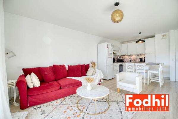 Appartement 4 pièces de 84 m² avec Balcon et un Parking en sous-sol.