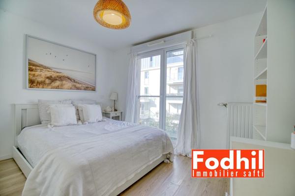 Appartement 4 pièces de 84 m² avec Balcon et un Parking en sous-sol.