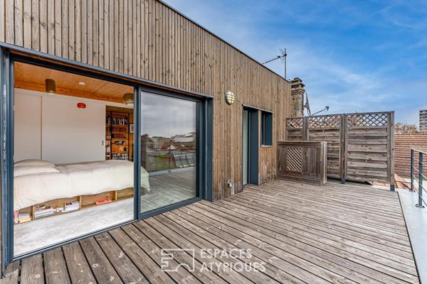 Maison d’architecte contemporaine à l’esprit loft avec jardin