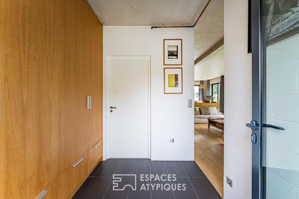 Maison d’architecte contemporaine à l’esprit loft avec jardin