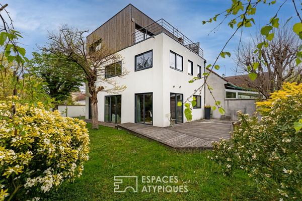 Maison d’architecte contemporaine à l’esprit loft avec jardin