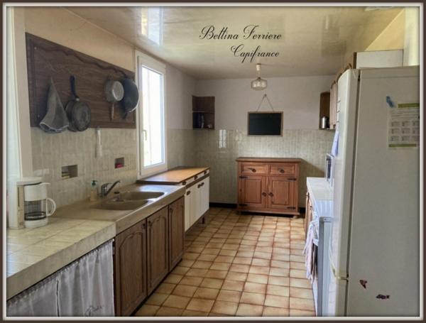 Maison familiale à rénover avec grand terrain arboré