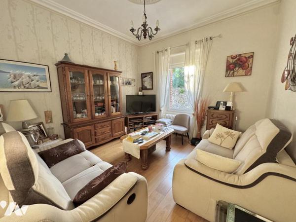 Maison de caractère avec beau jardin – plein centre de Savenay