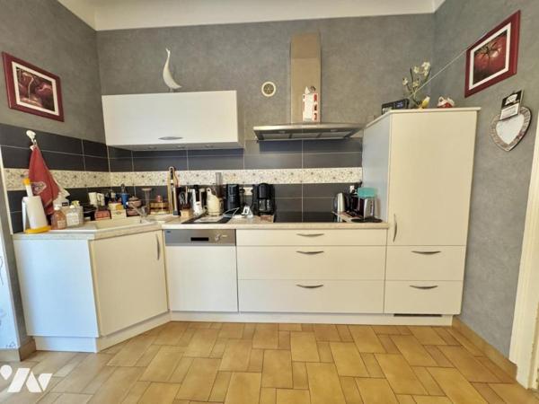 Maison de caractère avec beau jardin – plein centre de Savenay