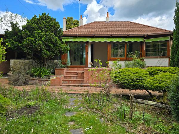 Maison T4 avec véranda au coeur d'un jardin  luxuriant