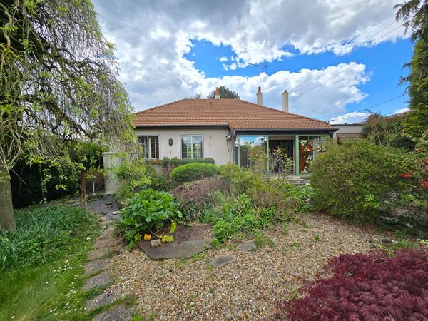 Maison T4 avec véranda au coeur d'un jardin  luxuriant