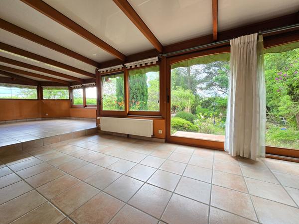 Maison T4 avec véranda au coeur d'un jardin  luxuriant
