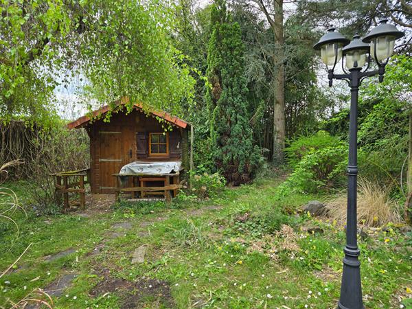 Maison T4 avec véranda au coeur d'un jardin  luxuriant