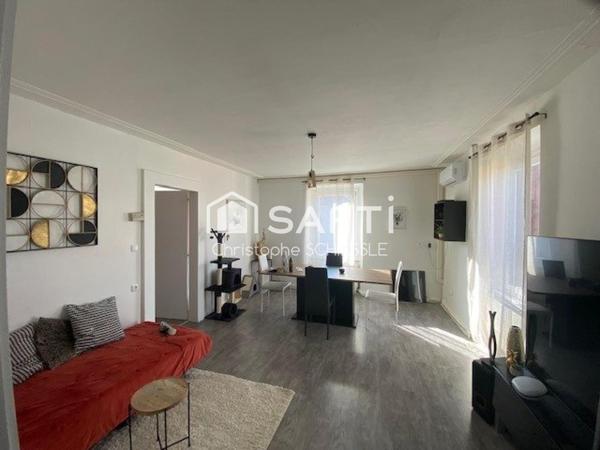 Immeuble de 3 appartements avec un garage et deux caves sur 3 ares 58