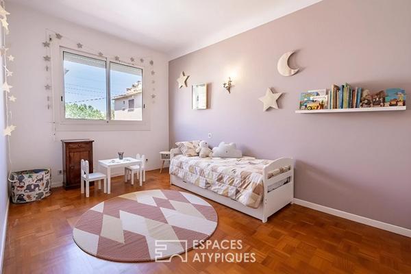 Appartement de charme avec balcon, garage, cave et jardin