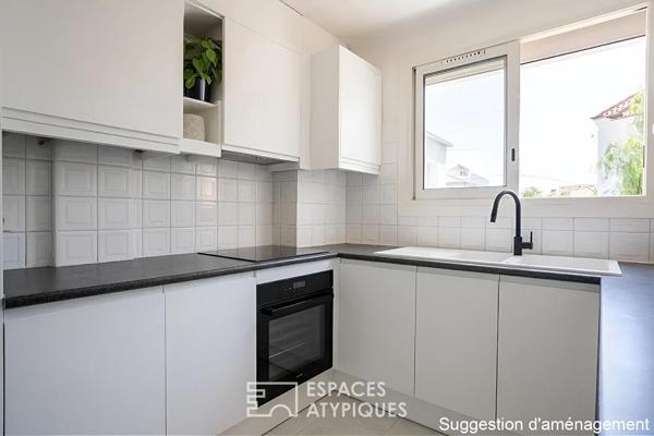 Appartement de charme avec balcon, garage, cave et jardin