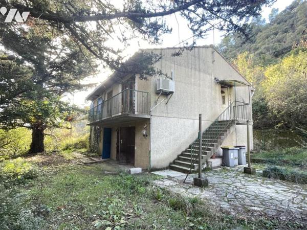 MAISON R+1 AVEC GARAGE ET TERRAIN A RENOVER