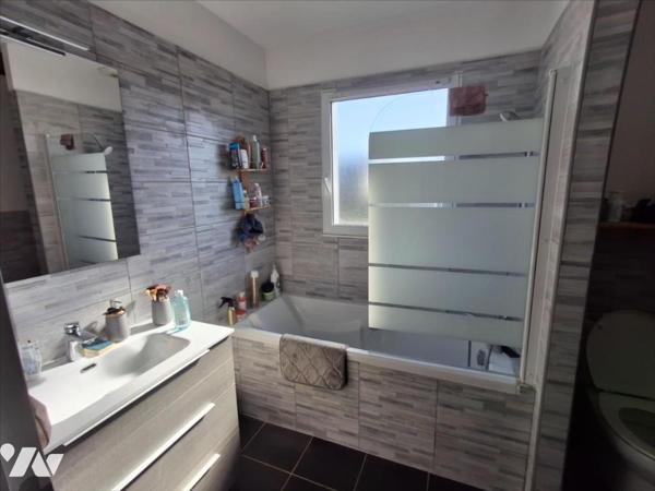 Couëron, maison récente de 117 m2, 4 ch, deux bains