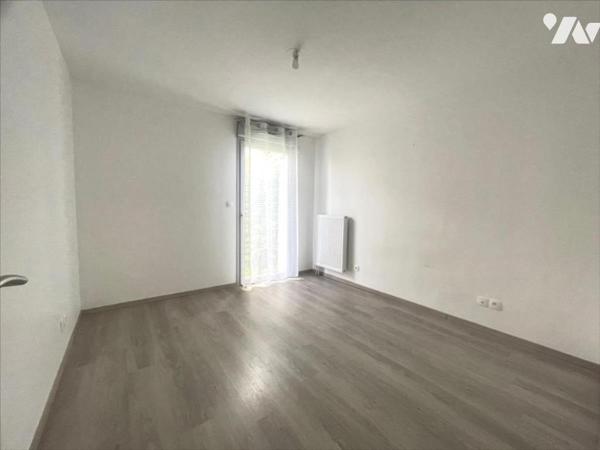 BEZANNES appartement en rez-de-jardin de type deux pièces principales, 50 m² surface habitable