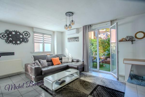 Appartement de 48 m² avec terrasse arborée et garage