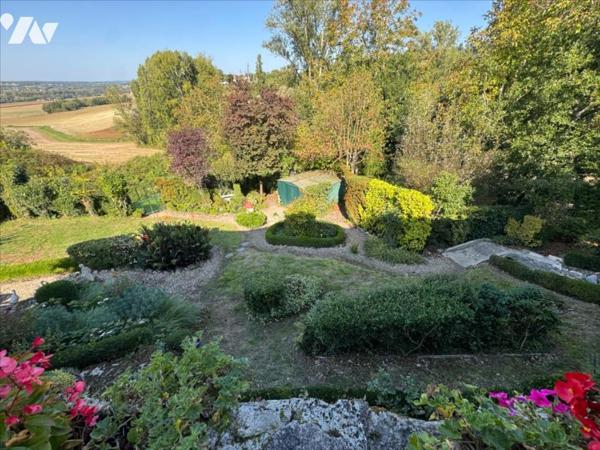 Au calme d'un hameau, habitation avec garage et jardin