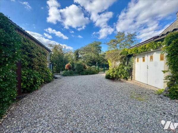 Au calme d'un hameau, habitation avec garage et jardin
