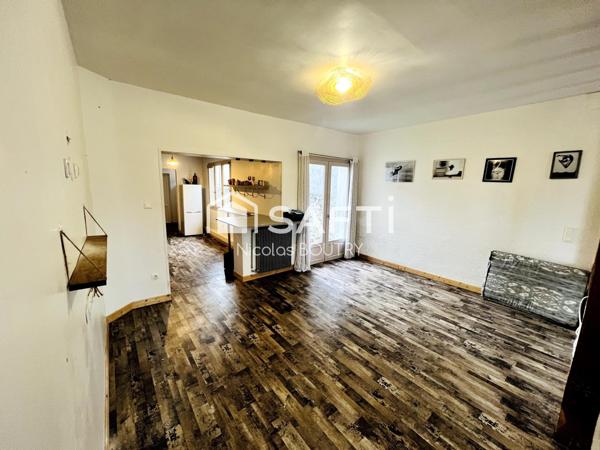 Maison prête à vivre avec 3 chambres, jardin, garage et chaudière récente