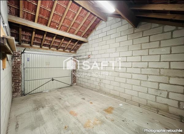 Maison prête à vivre avec 3 chambres, jardin, garage et chaudière récente