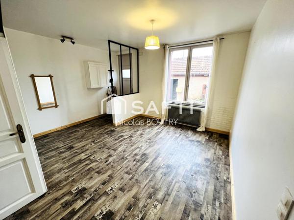 Maison prête à vivre avec 3 chambres, jardin, garage et chaudière récente