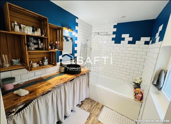 Maison prête à vivre avec 3 chambres, jardin, garage et chaudière récente