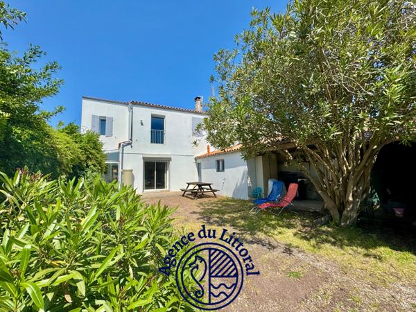 Maison 8 pièce(s) 5 chambre(s) 210 m²