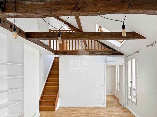 Charmant appartement rénové avec climatisation et poutres apparentes