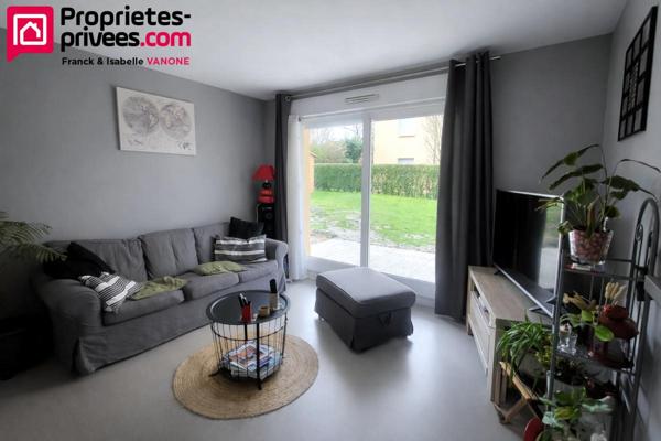 Appartement Type 3 - 73 m² habitables - place de parking privative + 1 garage - jardin