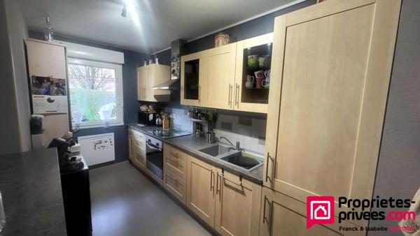 Appartement Type 3 - 73 m² habitables - place de parking privative + 1 garage - jardin