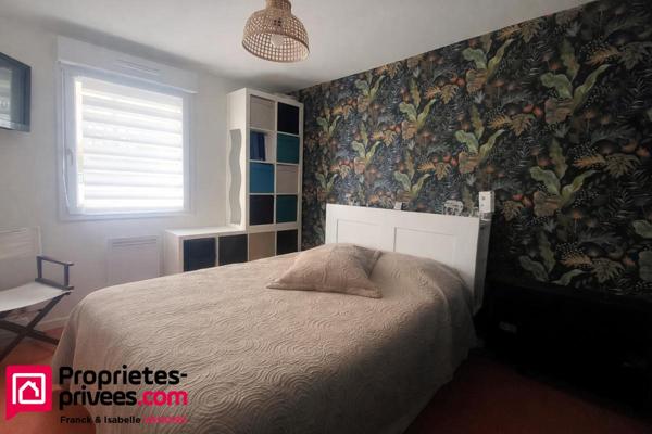 Appartement Type 3 - 73 m² habitables - place de parking privative + 1 garage - jardin