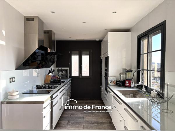 Appartement de standing avec terrasse, garage et parking