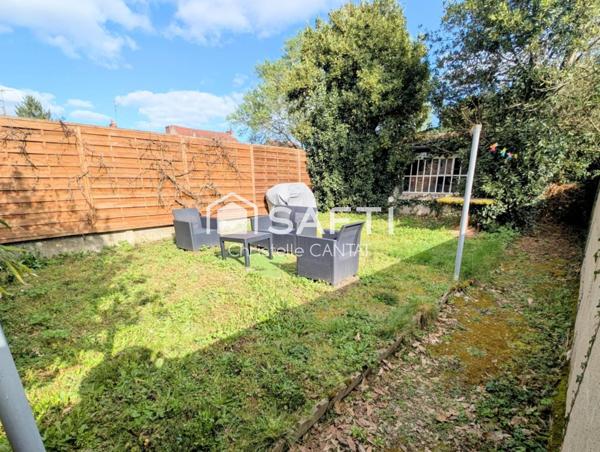 Maison composée de 2 appartements, cour, jardin.