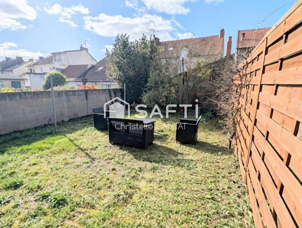 Maison composée de 2 appartements, cour, jardin.