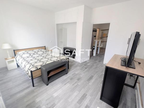 Maison composée de 2 appartements, cour, jardin.