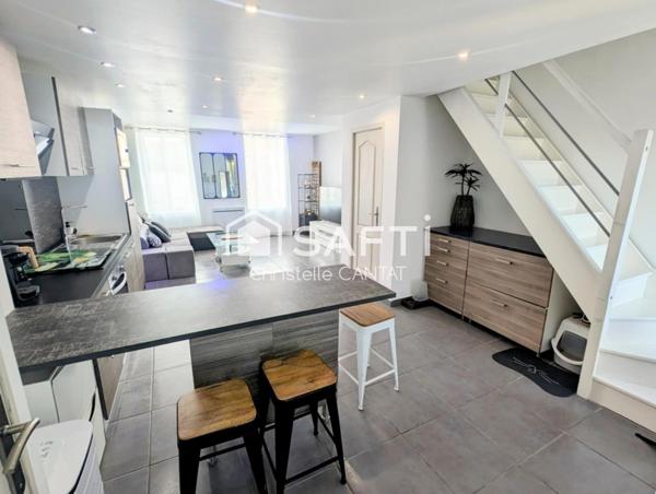 Maison composée de 2 appartements, cour, jardin.