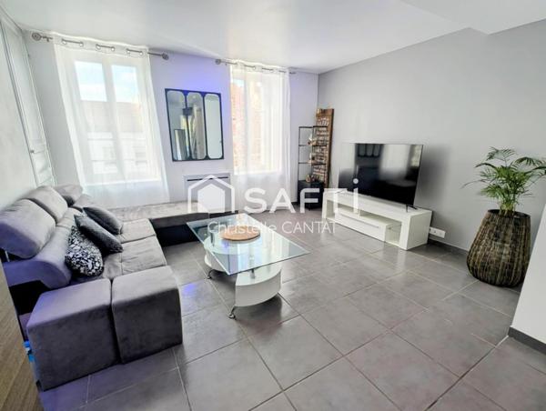 Maison composée de 2 appartements, cour, jardin.