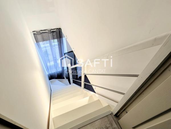 Maison composée de 2 appartements, cour, jardin.