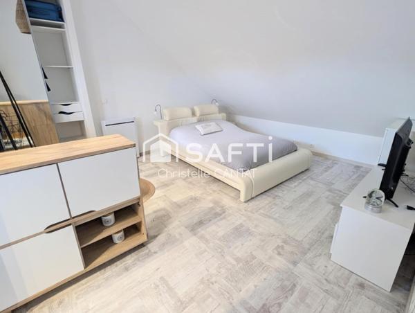 Maison composée de 2 appartements, cour, jardin.