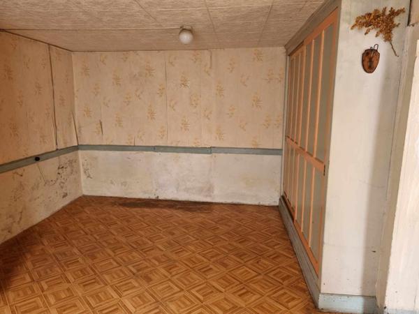 Maison avec terrain boiser