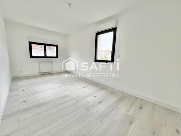 Maison 4 chambres avec jardin et places de parking
